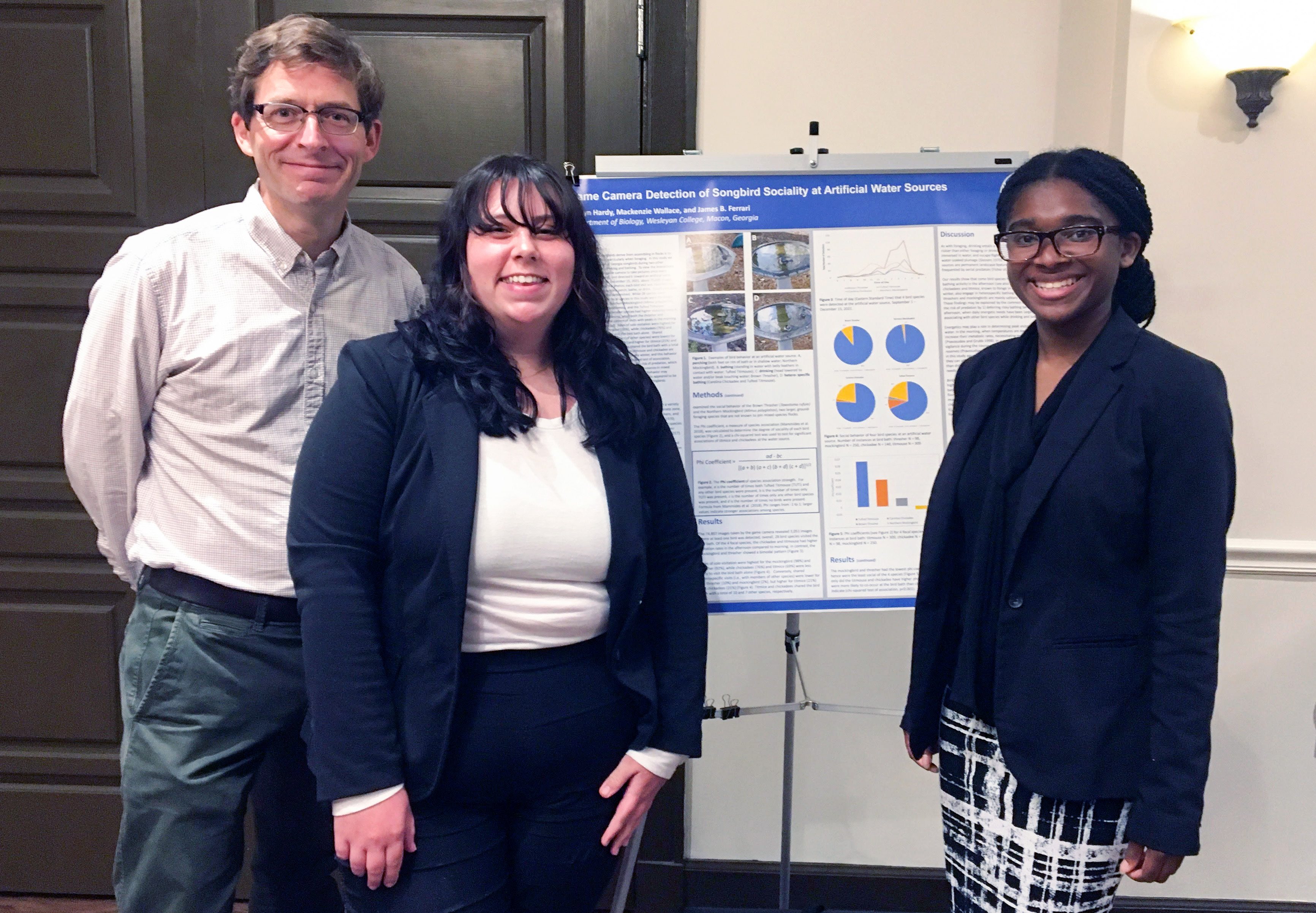 Students with research poster
