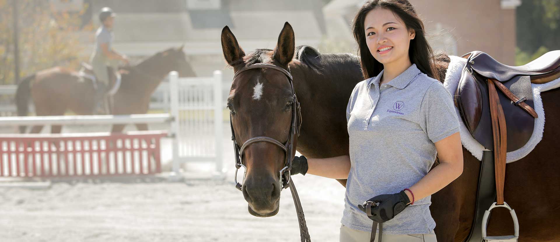equestrian student with horse banner