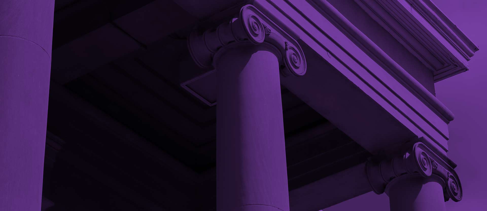 Columns of Candler building with purple overlay.