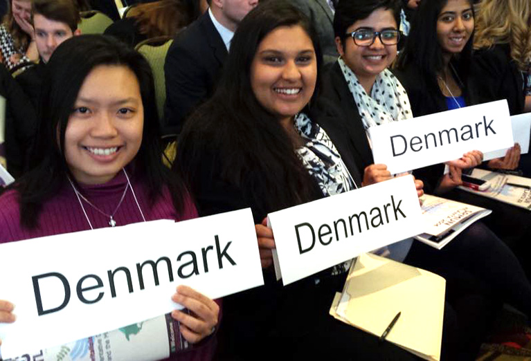 Model UN group with signs holding countries